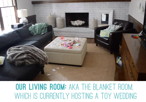 Living Room With Toys And Blankets Everywhere