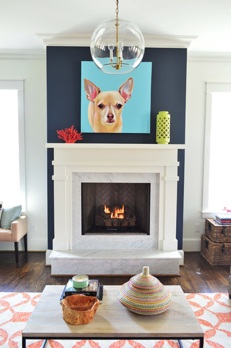 Modern Fireplace Painted Blue With Chihauhua Painting Over White Mantle