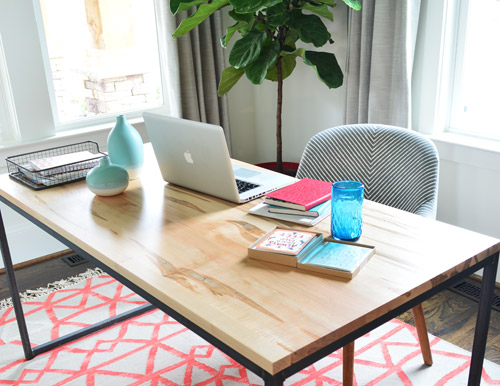 Wood And Metal Desk Floating In Modern Office Show House