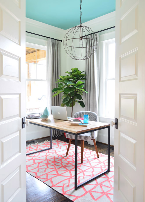 Modern Office Space With Shades Of Light Wire Globe Pendant And Blue Ceiling