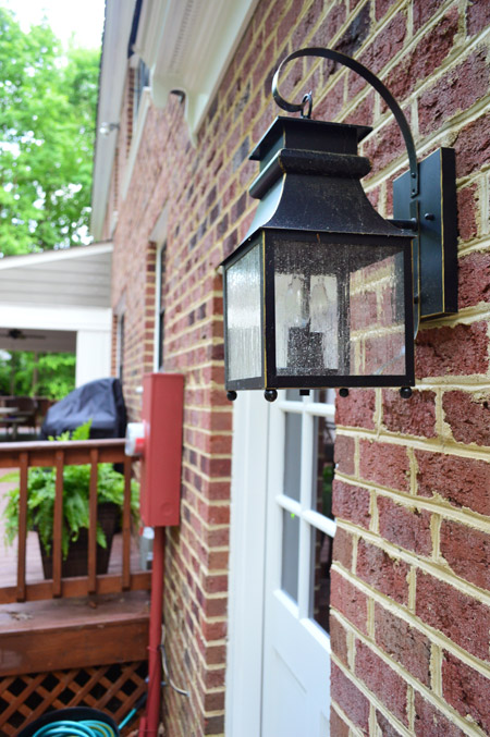 Traditional Lantern Outdoor Sconce By Garage Door