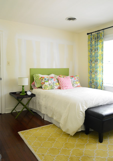 Unapinted bedroom with colorful accessories