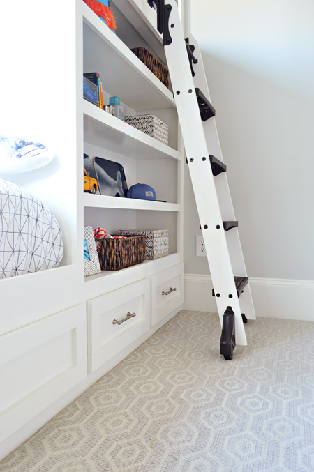 Library Ladder Leading to Lofted Reading Area Lounge In Boys Bedroom