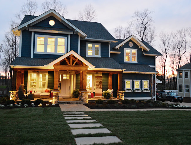 Modern Builder Show House With Newburg Green Siding At Night