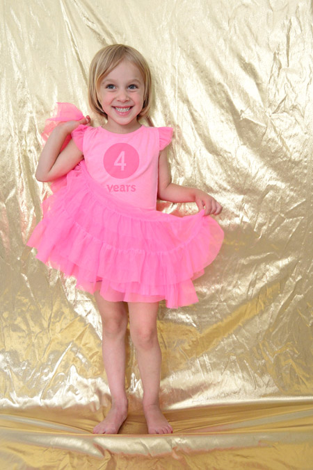 Birthday Photo Project 4 Year Old In Tutu Dress With Gold Shimmery Background