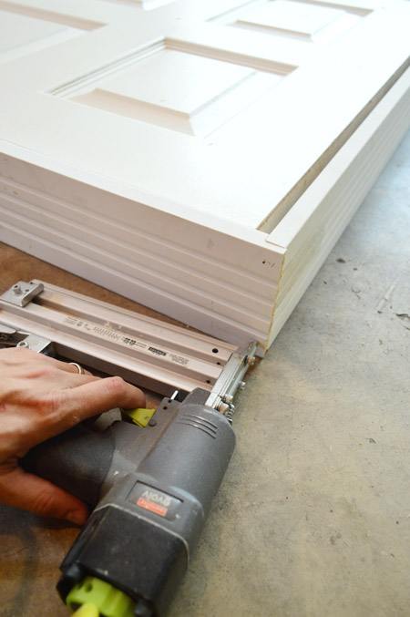 Nailing Together DIY Door Jamb From Top Of Rabbet Joint With Nail Gun