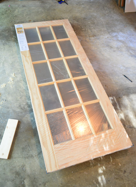 Unfinished 15 Pane Wood Door In Plastic Wrap For Bonus Room Entrance