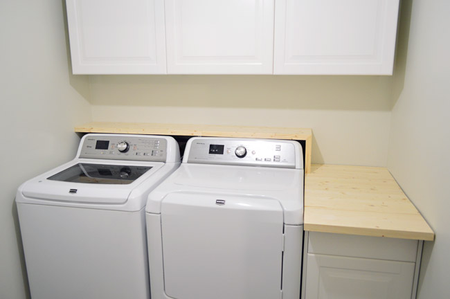 A Walnut Counter And Backsplash in the Laundry Room - Chris Loves Julia