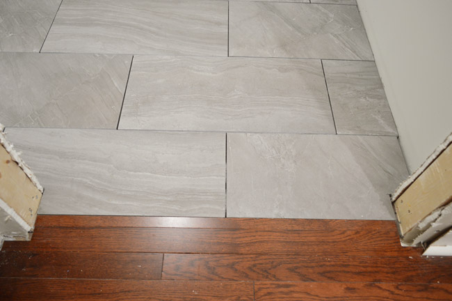 Laying Porcelain Tile In The Laundry, How To Install Porcelain Tile On Wood Floor