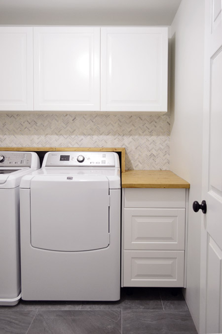 A Walnut Counter And Backsplash in the Laundry Room - Chris Loves Julia